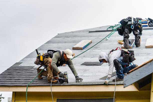 Professional Roofing technician working in Churubusco, IN